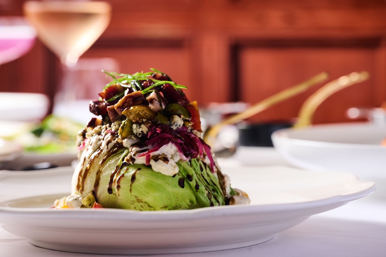 A wedge salad dressed with blue cheese and balsamic at Delmonico's